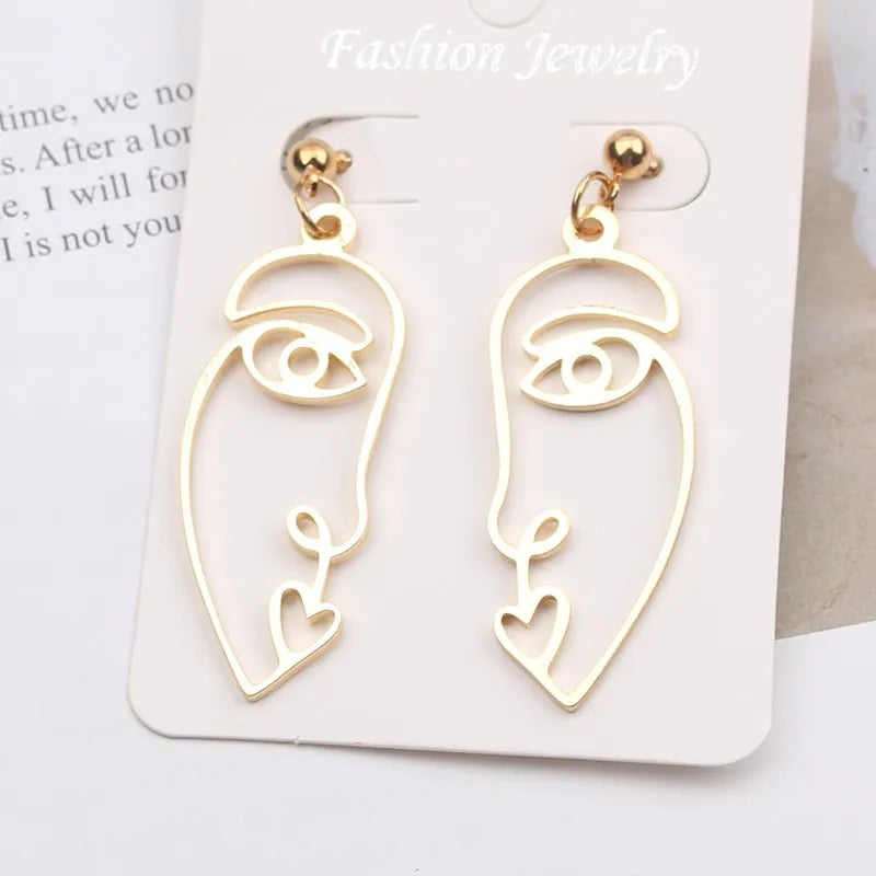 Hollow Out Face Drop Earrings