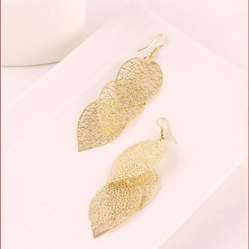 Delysia King hollow leaf earrings
